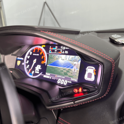 Lamborghini rear backup camera display on digital dashboard after CarPlay module installation